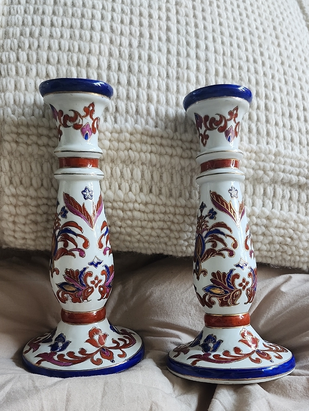 Pair Of ToyoWhite Ceramic Candlestick Holders with Blue and Red Floral Detailing